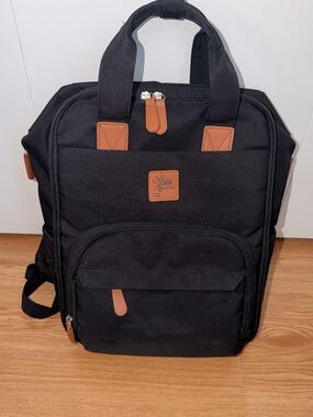 Black Canvas Backpack with Tan Accents - Stylish Everyday Bag